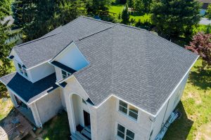 Aerial view of asphalt shingles on a residential property.