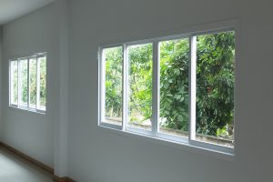 White walls with vinyl windows installed.